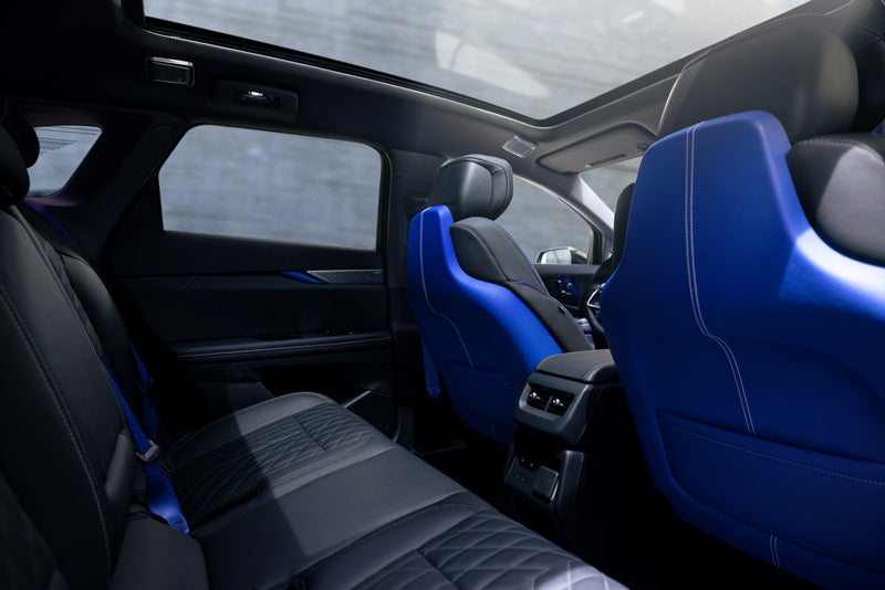 Back Seat View of the 2026 OPTIQ-V Blue Front Seats, Sun Roof, and Interior | Bomnin Cadillac Homestead in Homestead FL