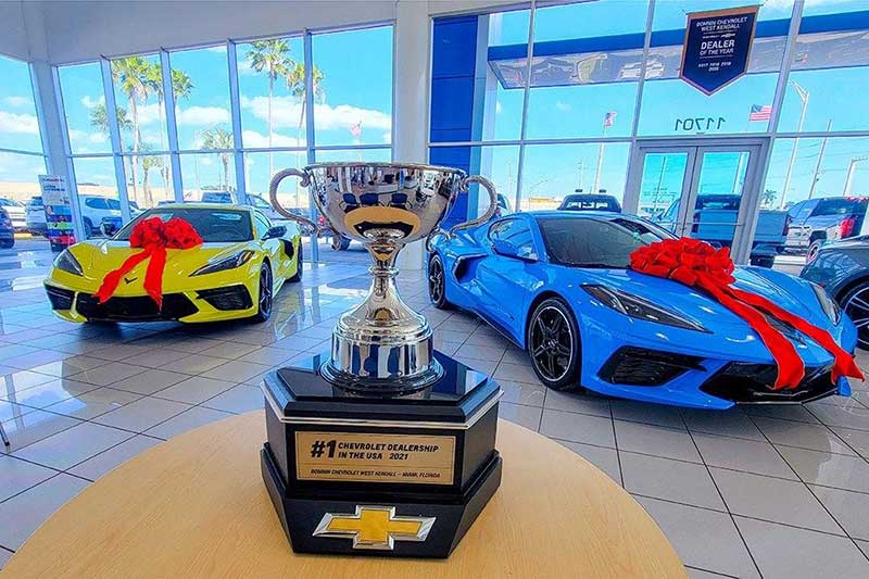 A trophy that says, number one dealership